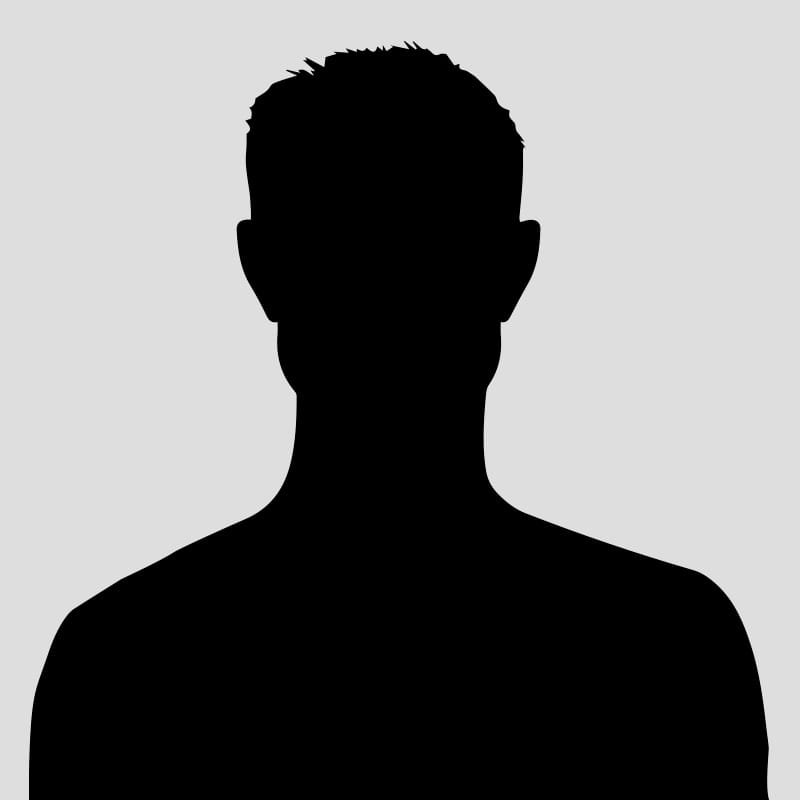 Silhouette einer Person mit kurzen Haaren vor einem hellgrauen Hintergrund.